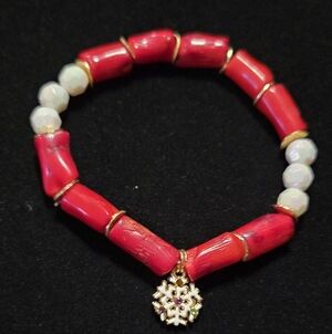 Red and White Beaded Bracelet with Snowflake Charm